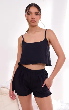 Ensemble de pyjama en maille tissée noire à débardeur et short boutonné volantés