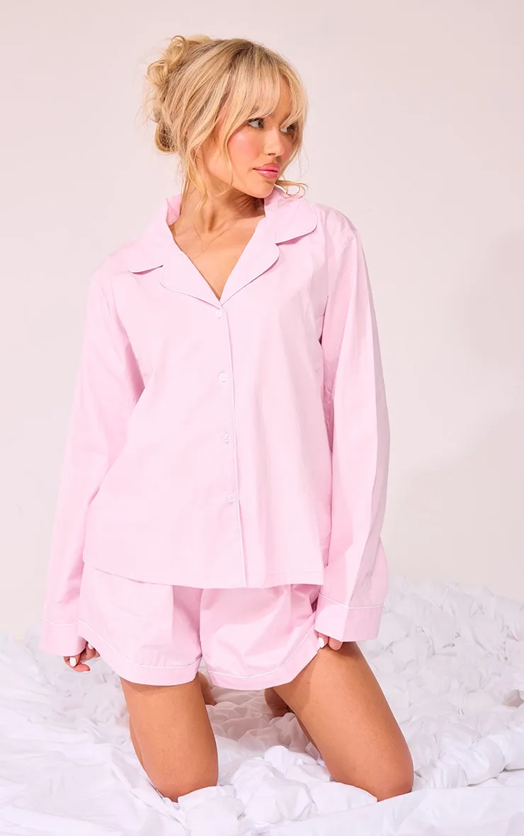 Ensemble de pyjama en popeline de coton rose tendre liserée à chemise manches longues et short