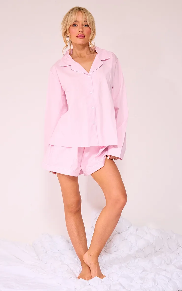 Ensemble de pyjama en popeline de coton rose tendre liserée à chemise manches longues et short