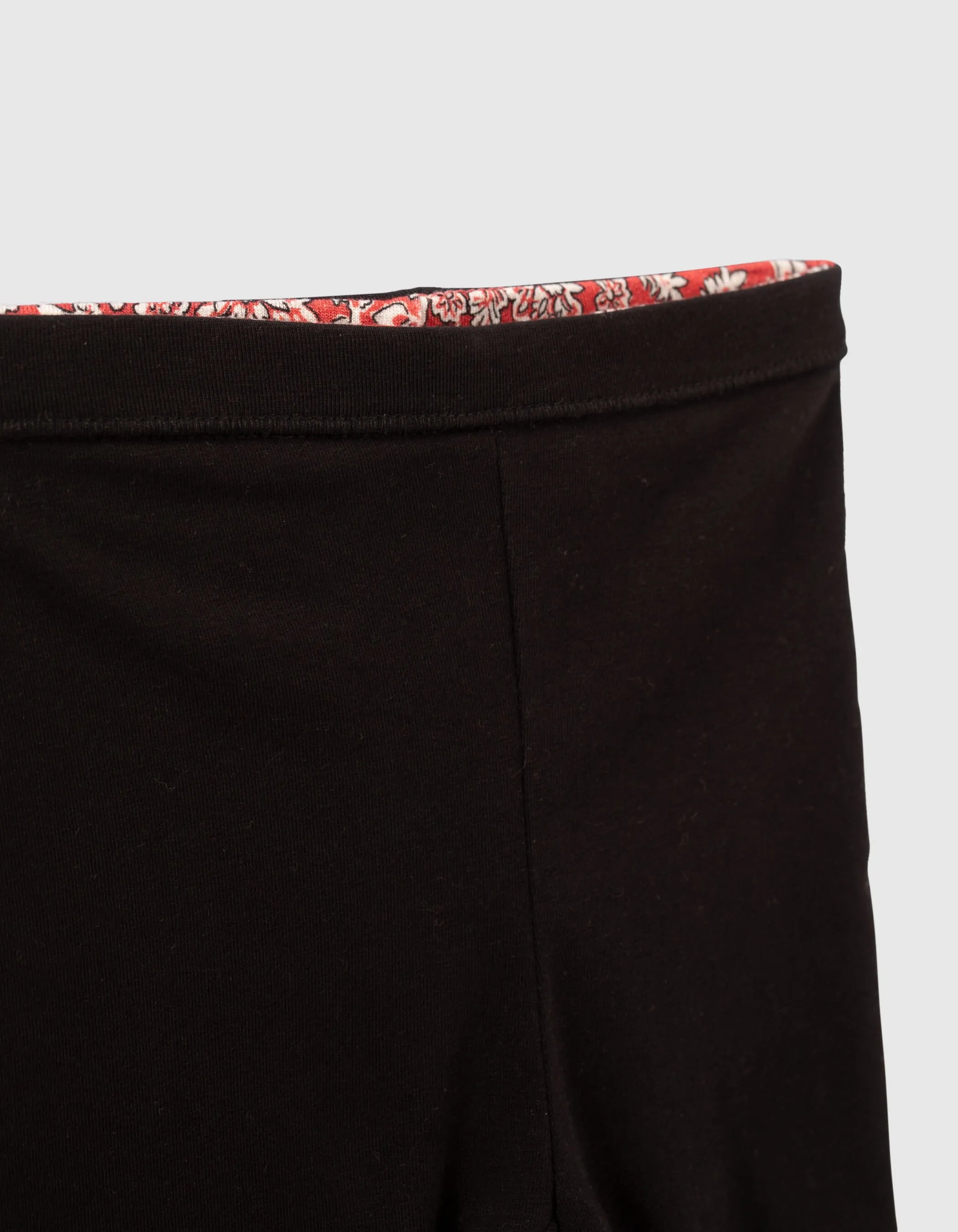 Leggings réversible rouge imprimé et noir bébé fille