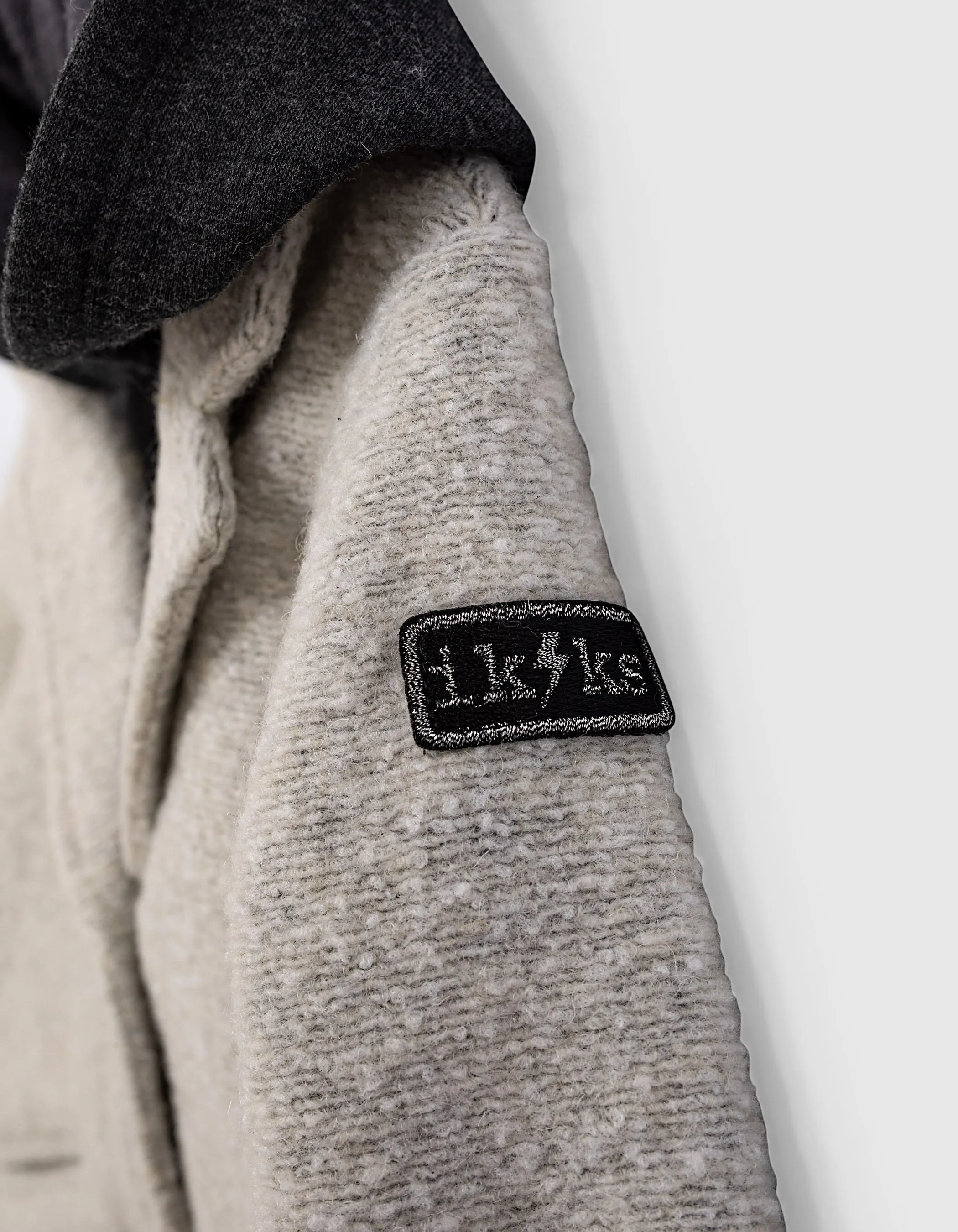 Manteau gris chiné foncé parmenture à capuche bébé fille