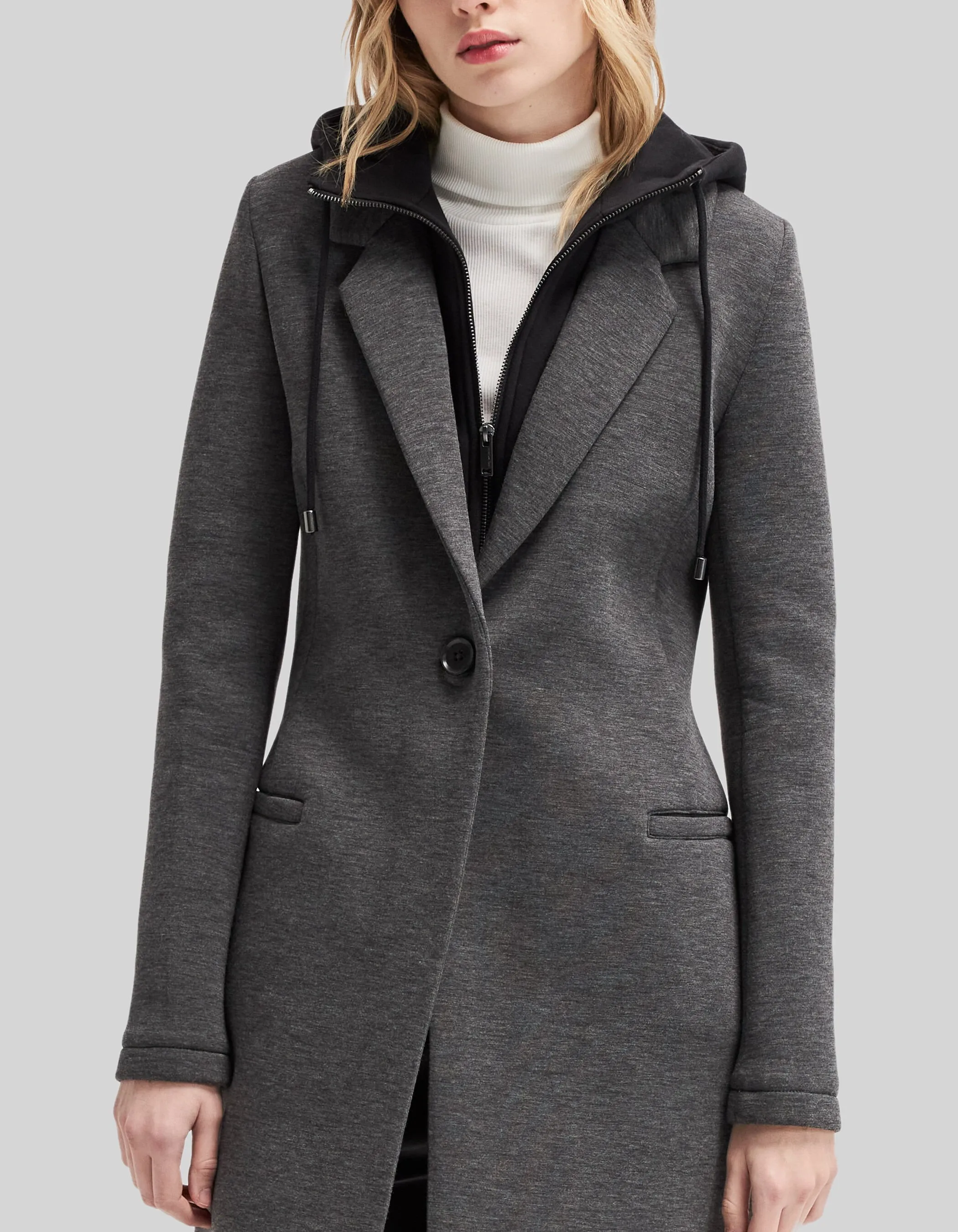 Manteau long en néoprène et capuche amovible femme