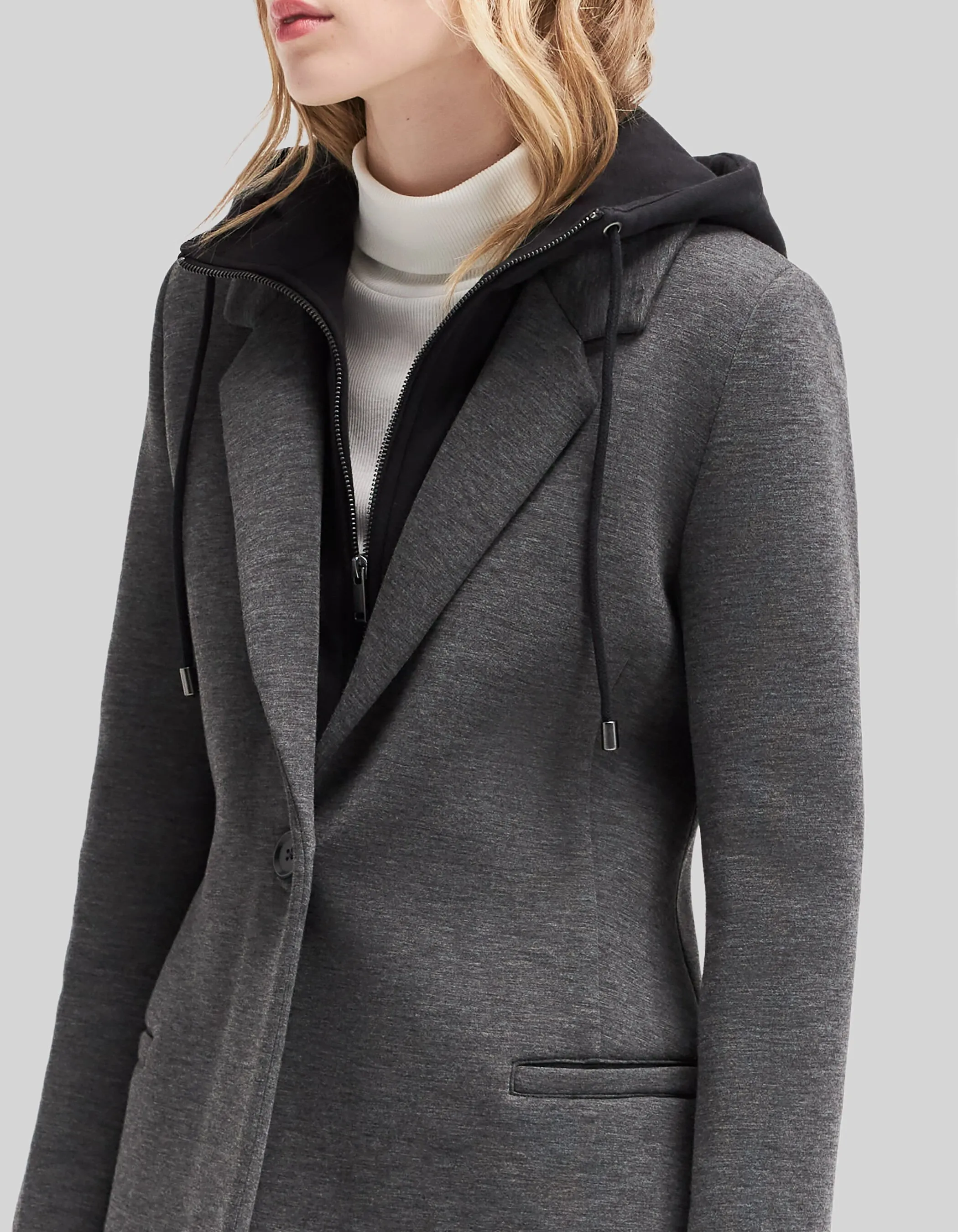 Manteau long en néoprène et capuche amovible femme