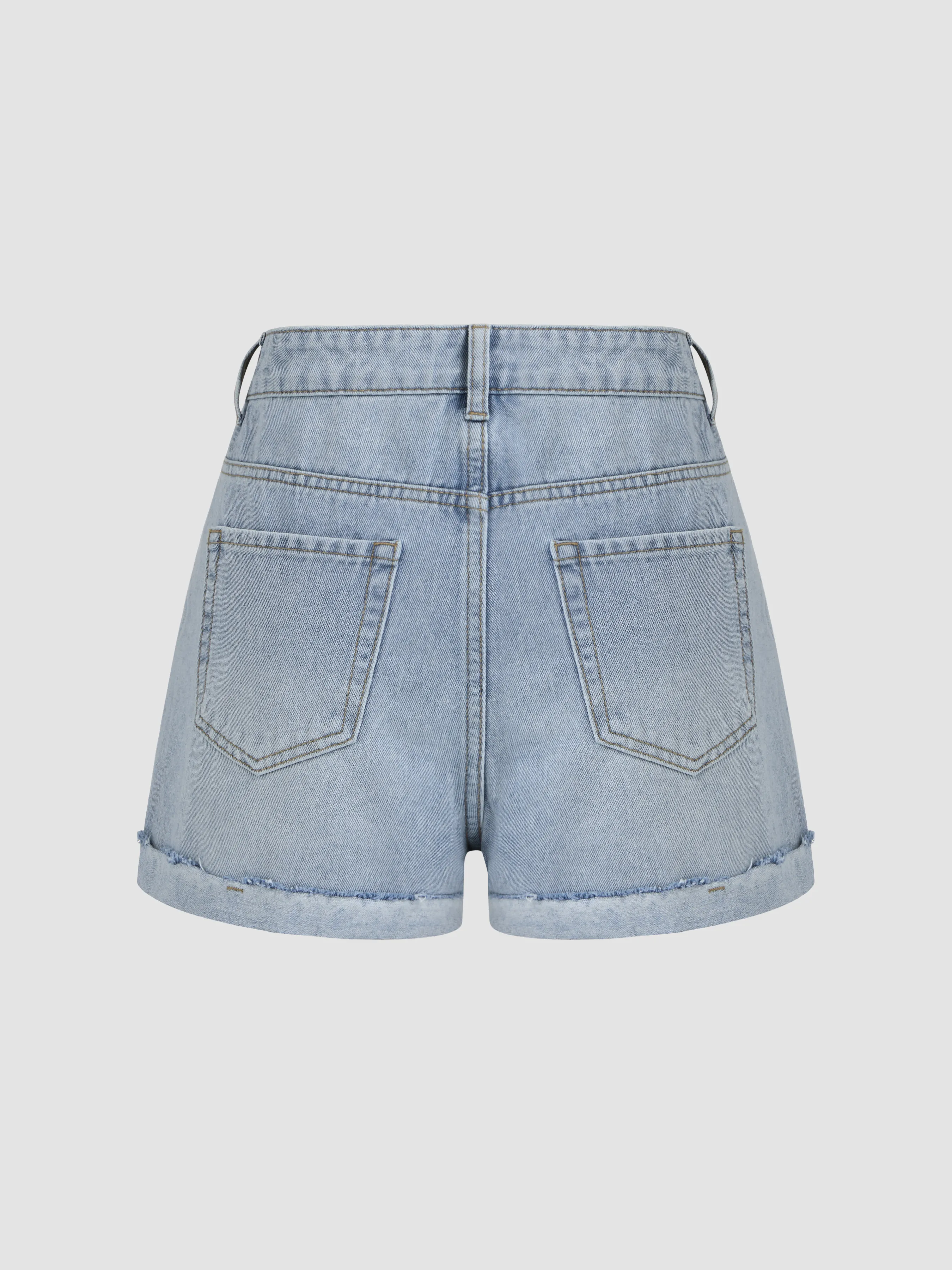 Shorts en jean à taille moyenne et poches unies